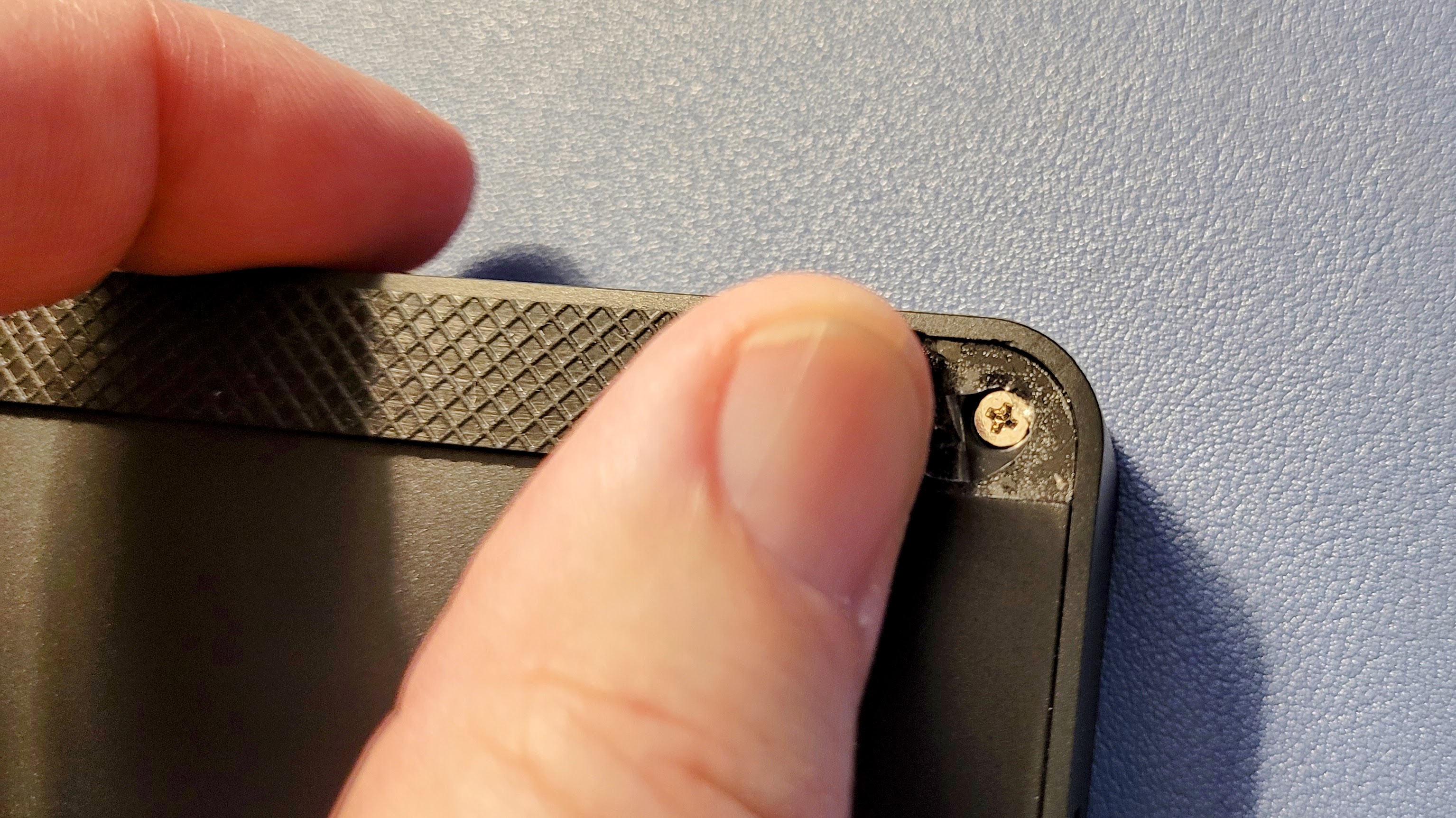 Screws are hidden under rubber strips